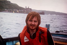 Image of a young Chris McTernan opposite Fort Bovisand, Plymouth Sound in the mid seventies on a Paul Cragg marine biology field trip.
